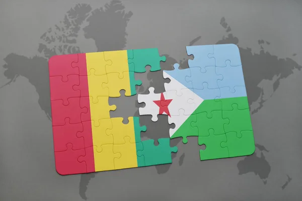Головоломка с национальным флагом Гвинеи и Джибути на карте мира — стоковое фото