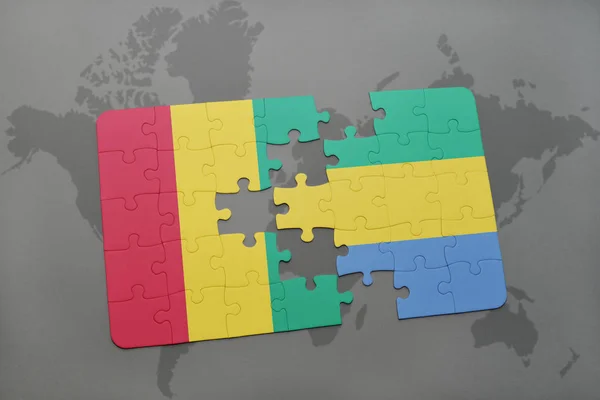 A nemzeti zászló, guinea és gabon a világtérképen puzzle — Stock Fotó