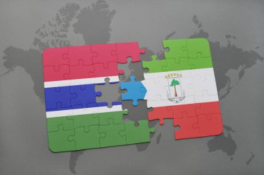 Gambiya ve Ekvator Ginesi ulusal bayrak bir dünya haritası üzerinde ile bulmaca