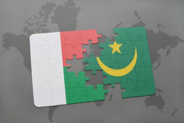 Madagaskar ve Moritanya ulusal bayrak bir dünya haritası üzerinde ile bulmaca