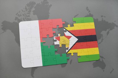 bir dünya haritası üzerinde Madagaskar ve Zimbabve Ulusal bayrakla bulmaca