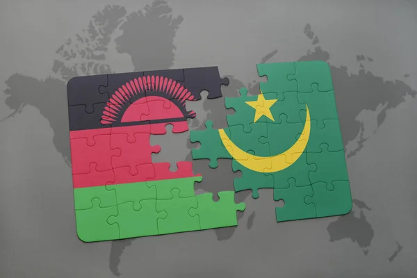 Rompecabezas con la bandera nacional de Malawi y Mauritania en un mapa del mundo — Foto de Stock