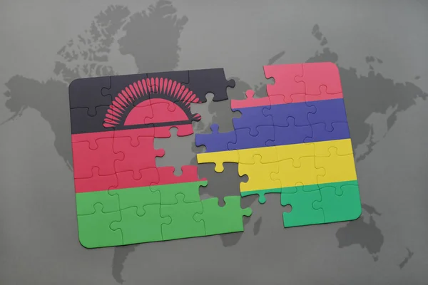 Puzzel met de nationale vlag van malawi en mauritius op een wereldkaart — Stockfoto