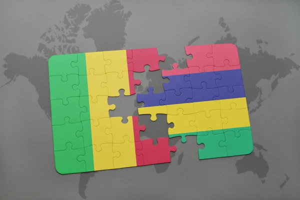 A nemzeti zászló, mali és mauritius egy világtérképen puzzle — Stock Fotó