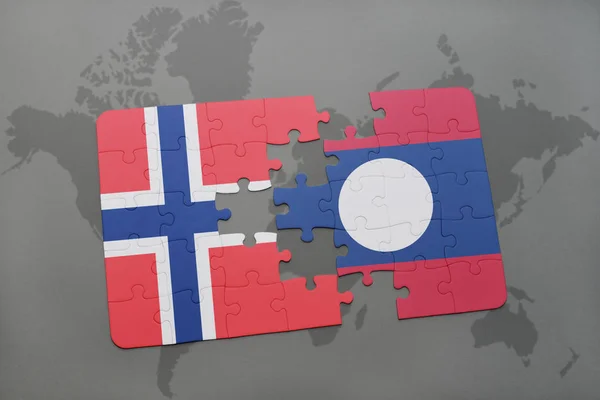 Puzzle with the national flag of norway and laos on a world map — Stock Photo, Image