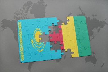 Kazakistan ve bir dünya haritası üzerinde Gine bayrağı ile bulmaca