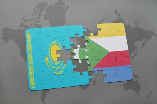 益智与哈萨克斯坦和科摩罗国旗在世界地图上 — 图库照片