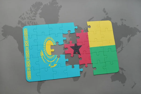 Puzzle a nemzeti zászló, Kazahsztán és a guinea bissau-ra egy világ Térkép — Stock Fotó