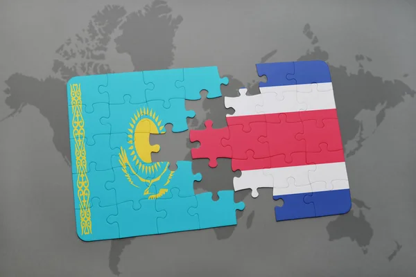 A nemzeti zászló, Kazahsztán és a costa rica, a világtérképen puzzle — Stock Fotó