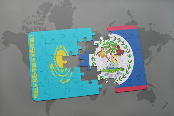 Puzzle con la bandiera nazionale del kazakhstan e belize su una mappa del mondo — Foto Stock