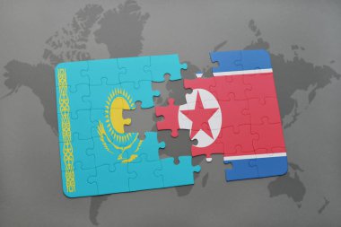 Kazakistan ve Kuzey Kore ulusal bayrak bir dünya haritası üzerinde ile bulmaca