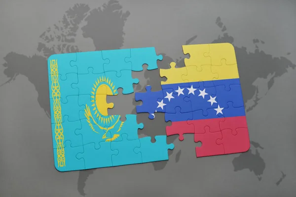 Головоломка з Національний прапор Казахстану і Венесуела на карті світу — стокове фото