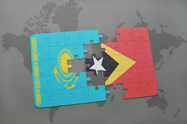Kazahsztán zászlaja puzzle és Kelet-timor a világtérképen — Stock Fotó