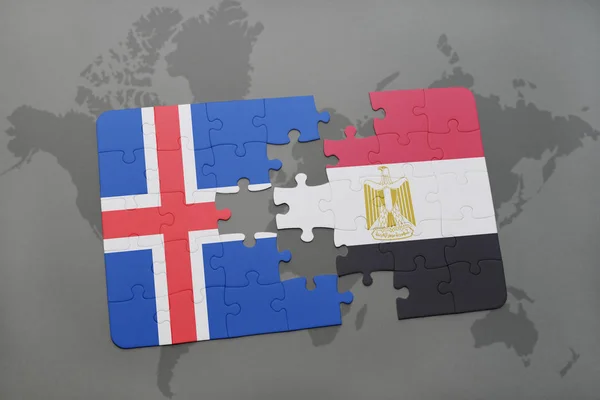Пазл з національним прапором Ісландії та Єгипту на карті світу — стокове фото