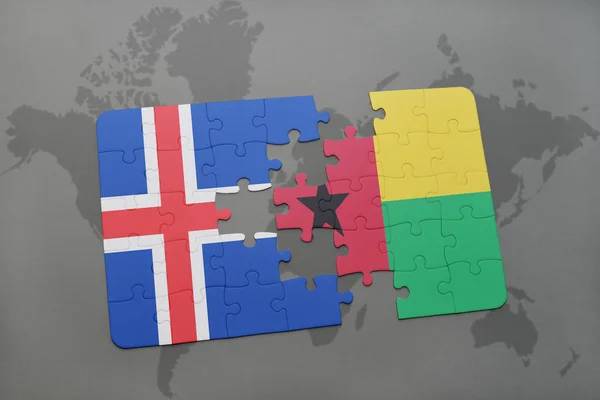 Puzzle avec le drapeau national de la péninsule et de la Guinée-Bissau sur une carte du monde — Photo