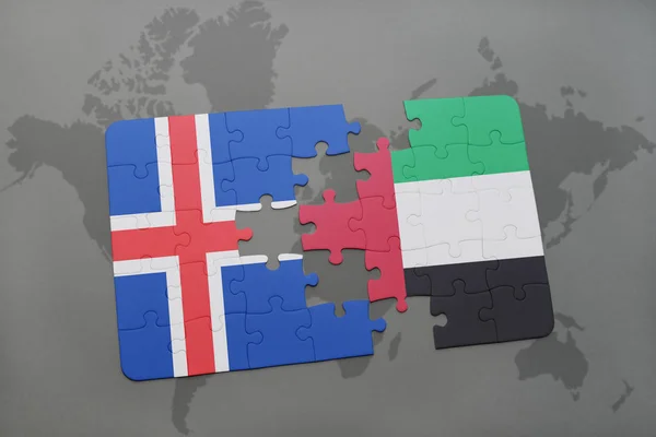 Rompecabezas con la bandera nacional de iceland y Emiratos Árabes Unidos en un mapa del mundo —  Fotos de Stock