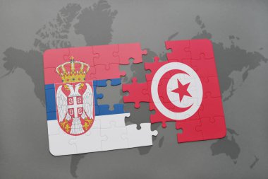 bir dünya haritası üzerinde Sırbistan ve Tunus bayrağı ulusal ile bulmaca
