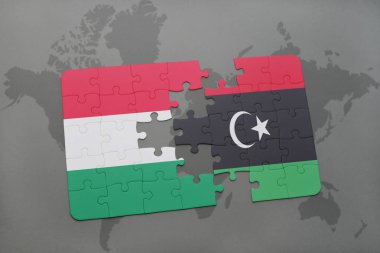 Macaristan ve libya ulusal bayrak bir dünya haritası üzerinde ile bulmaca