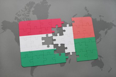 Macaristan ve Madagaskar ulusal bayrak bir dünya haritası üzerinde ile bulmaca