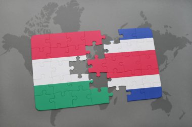 Macaristan Kosta Rika ve bir dünya haritası üzerinde ulusal bayrak ile bulmaca