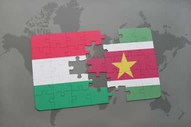 Macaristan ve Surinam ulusal bayrak bir dünya haritası üzerinde ile bulmaca