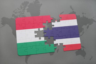 Macaristan ve Tayland ulusal bayrak bir dünya haritası üzerinde ile bulmaca