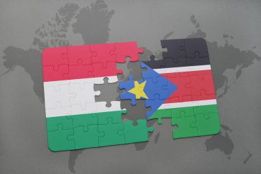 Macaristan ve bir dünya haritası üzerinde Güney sudan bayrağı ile bulmaca