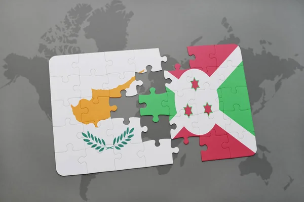 Quebra-cabeça com a bandeira nacional de Chipre e Burundi em um mapa do mundo — Fotografia de Stock