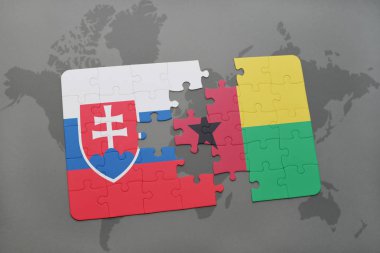 Bulmaca ile Slovakya ve Gine bayrağı bissau bir dünya haritası üzerinde