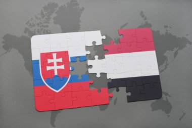yemen ve Slovakya ulusal bayrak bir dünya haritası üzerinde ile bulmaca