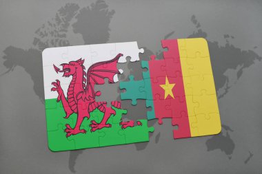 Galler ve Kamerun ulusal bayrak bir dünya haritası üzerinde ile bulmaca