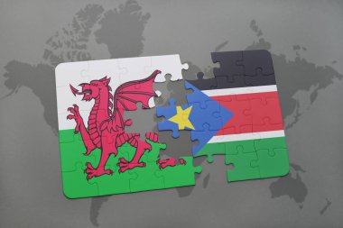 Galler ve bir dünya haritası üzerinde Güney sudan bayrağı ile bulmaca