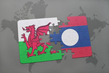 Galler ve laos ulusal bayrak bir dünya haritası üzerinde ile bulmaca