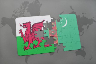 Türkmenistan ve Galler Ulusal bayrak bir dünya haritası üzerinde ile bulmaca