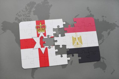 Kuzey İrlanda ve Mısır ulusal bayrak bir dünya haritası üzerinde ile bulmaca