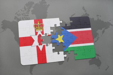 Kuzey İrlanda ve bir dünya haritası üzerinde Güney sudan bayrağı ile bulmaca
