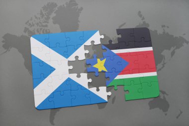 İskoçya ve bir dünya haritası üzerinde Güney sudan bayrağı ile bulmaca