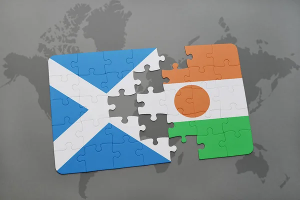 puzzle with the national flag of scotland and niger on a world map