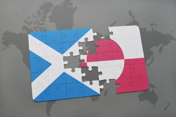 puzzle with the national flag of scotland and greenland on a world map