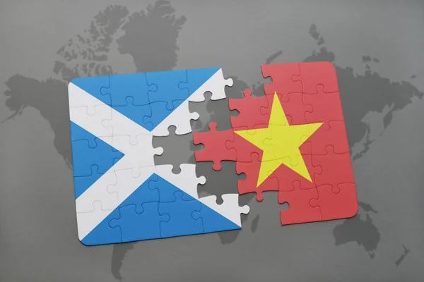 Puzzle with the national flag of scotland and vietnam on a world map — Stock Photo, Image