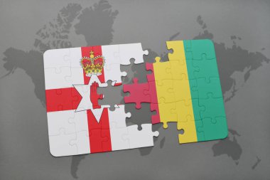 Kuzey İrlanda ve bir dünya haritası üzerinde Gine bayrağı ile bulmaca
