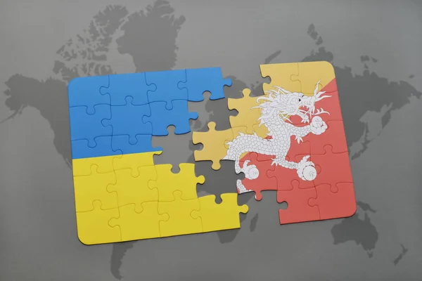 Puzzel met de nationale vlag van Oekraïne en bhutan op een wereldkaart — Stockfoto