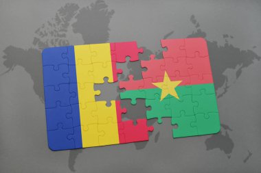 Romanya ve burkina faso ulusal bayrak bir dünya haritası üzerinde ile bulmaca