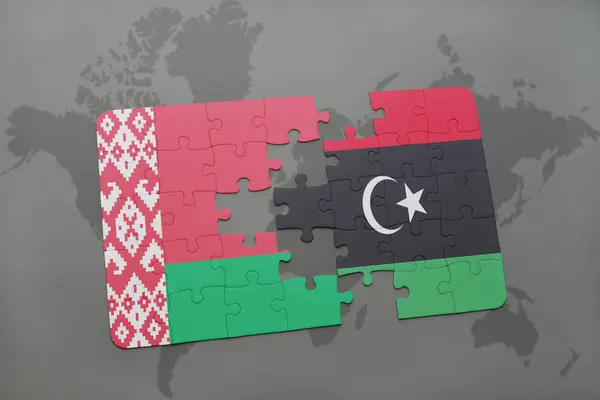 Παζλ με την εθνική σημαία της Λευκορωσίας και τη Λιβύη σε ένα παγκόσμιο χάρτη — Φωτογραφία Αρχείου