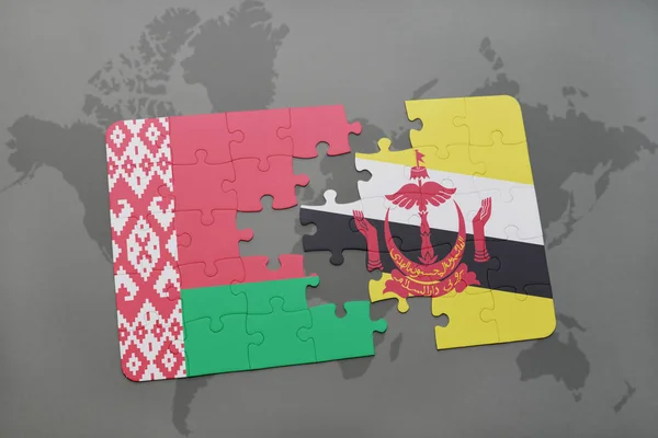 Puzzle with the national flag of belarus and brunei on a world map — Stock Photo, Image