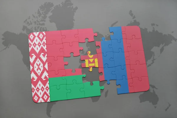 Puzzel met de nationale vlag van Wit-Rusland en Mongolië op een wereldkaart — Stockfoto