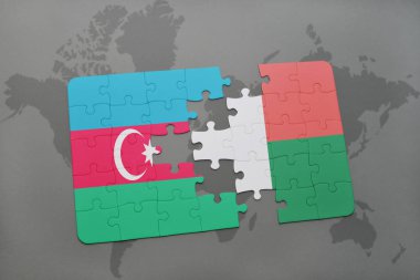 bir dünya haritası üzerinde Azerbaycan ve Madagaskar bayrağı ulusal ile bulmaca