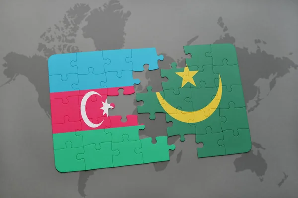 Puzzle with the national flag of azerbaijan and mauritania on a world map — Stock Photo, Image
