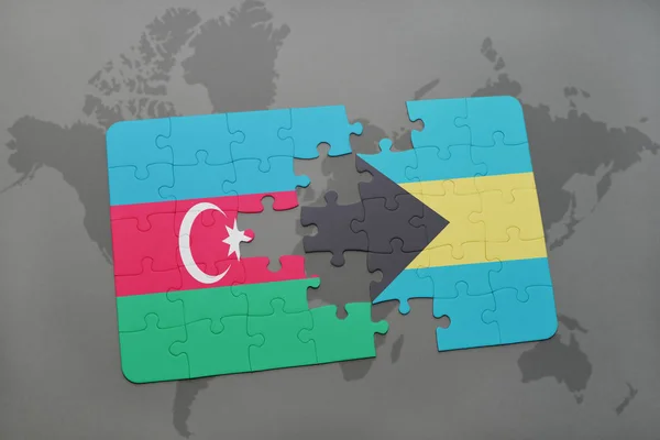 Puzzel met de nationale vlag van Azerbeidzjan en de Bahama's op een wereldkaart — Stockfoto