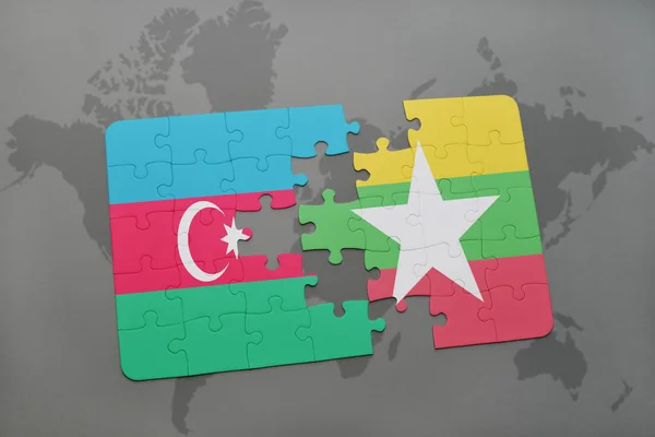 Puzzel met de nationale vlag van Azerbeidzjan en myanmar op een wereldkaart — Stockfoto